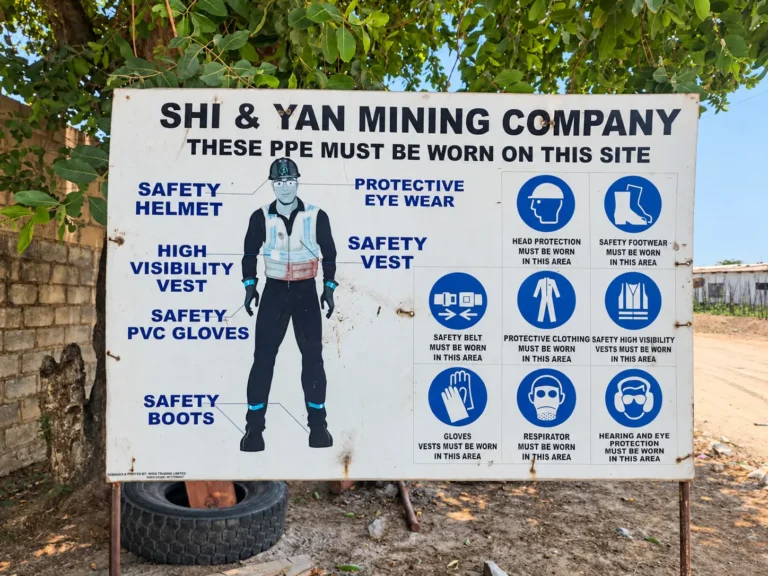Site PPE safety sign at the Shi and Yan mining facility
