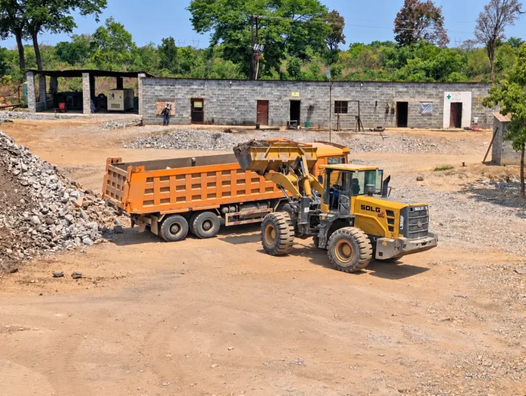Wheel loader loading a tipper at the Shi and Yan mining facility